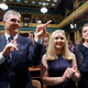 Marc Mallory, left, with daughters